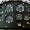 Toru's instrument panel. Note the hyraulic prerotator lines on the sides of the instrument panel.